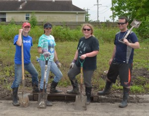 Shoveling silt on the streets of the Ninth Ward with Avital, Susan, and Brian.
