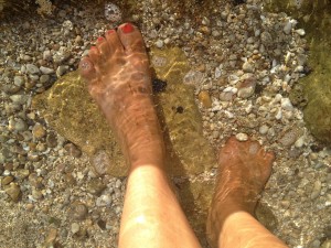 Toes in the surf after climbing Rosh Haniqra.